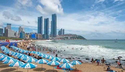 Haeundae Beach and the Busan waterfront skyline in Haeundae-gu