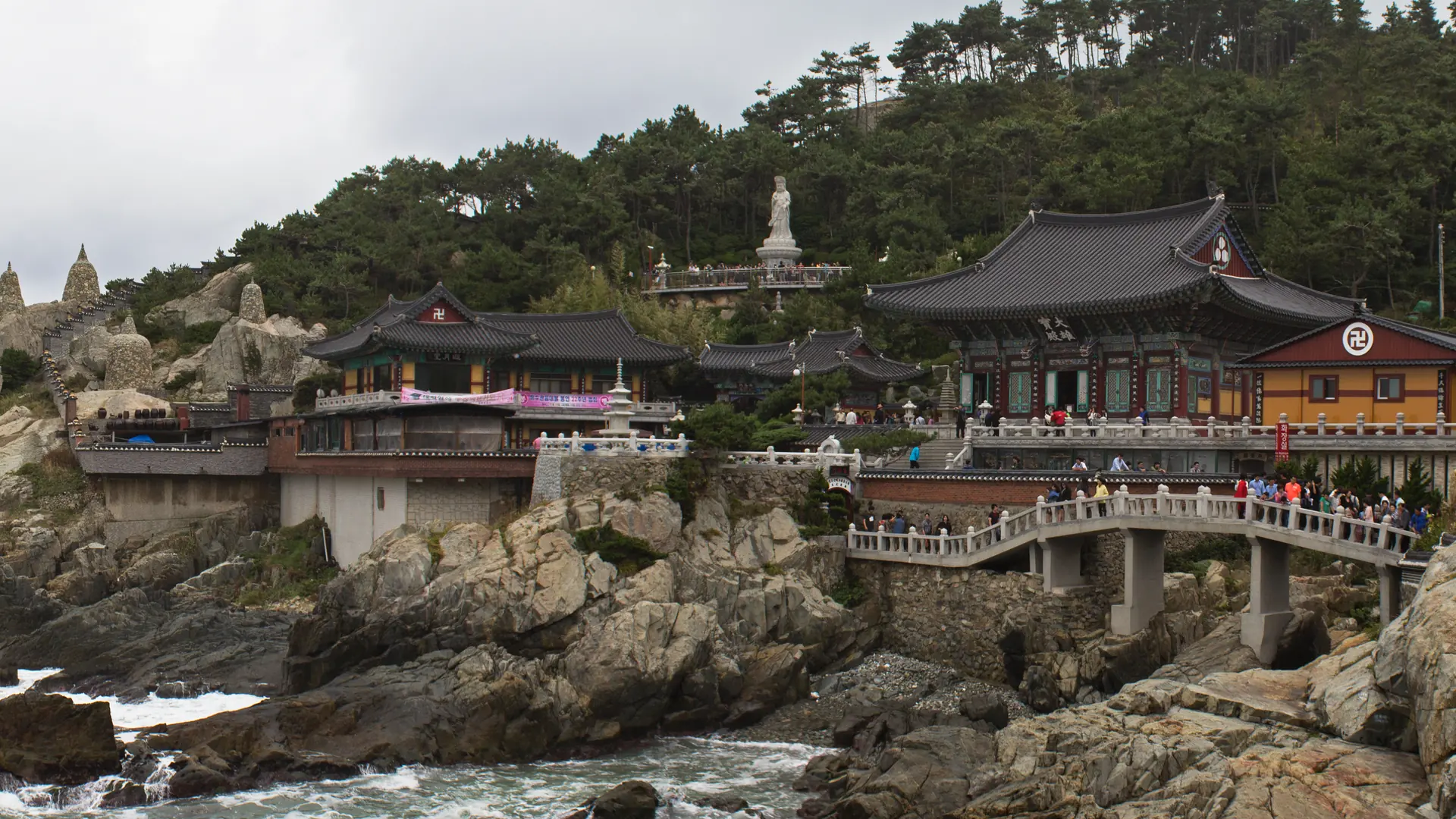 Haedong Yonggungsa temple beside the rocky coast in Gijang, Busan, during daylight
